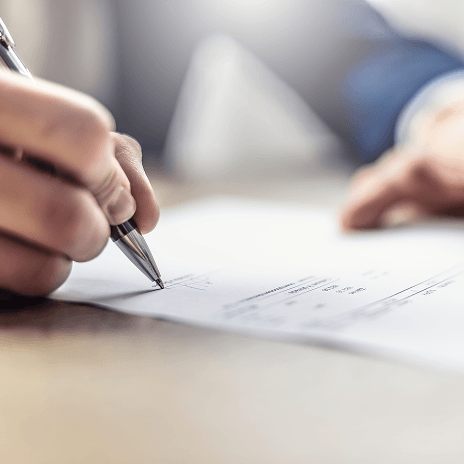 Legal professional completing client documentation