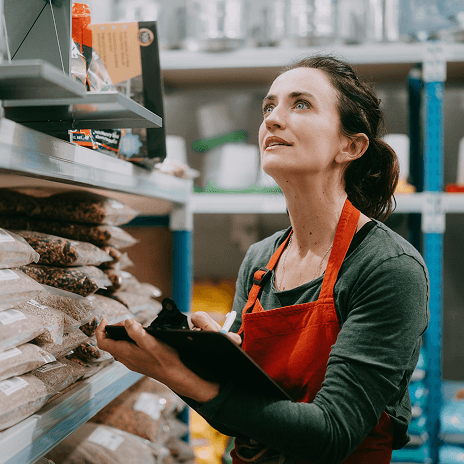 Retail associate managing inventory to support customer service