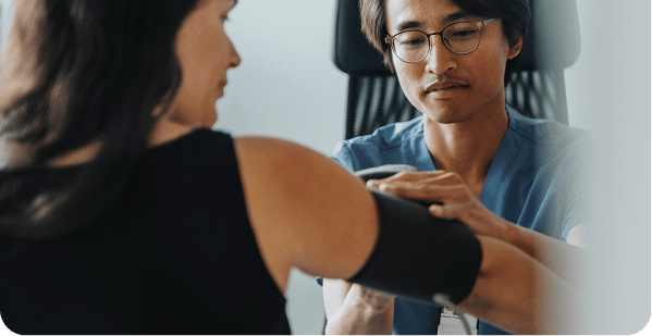 Physician examining a patient during an appointment